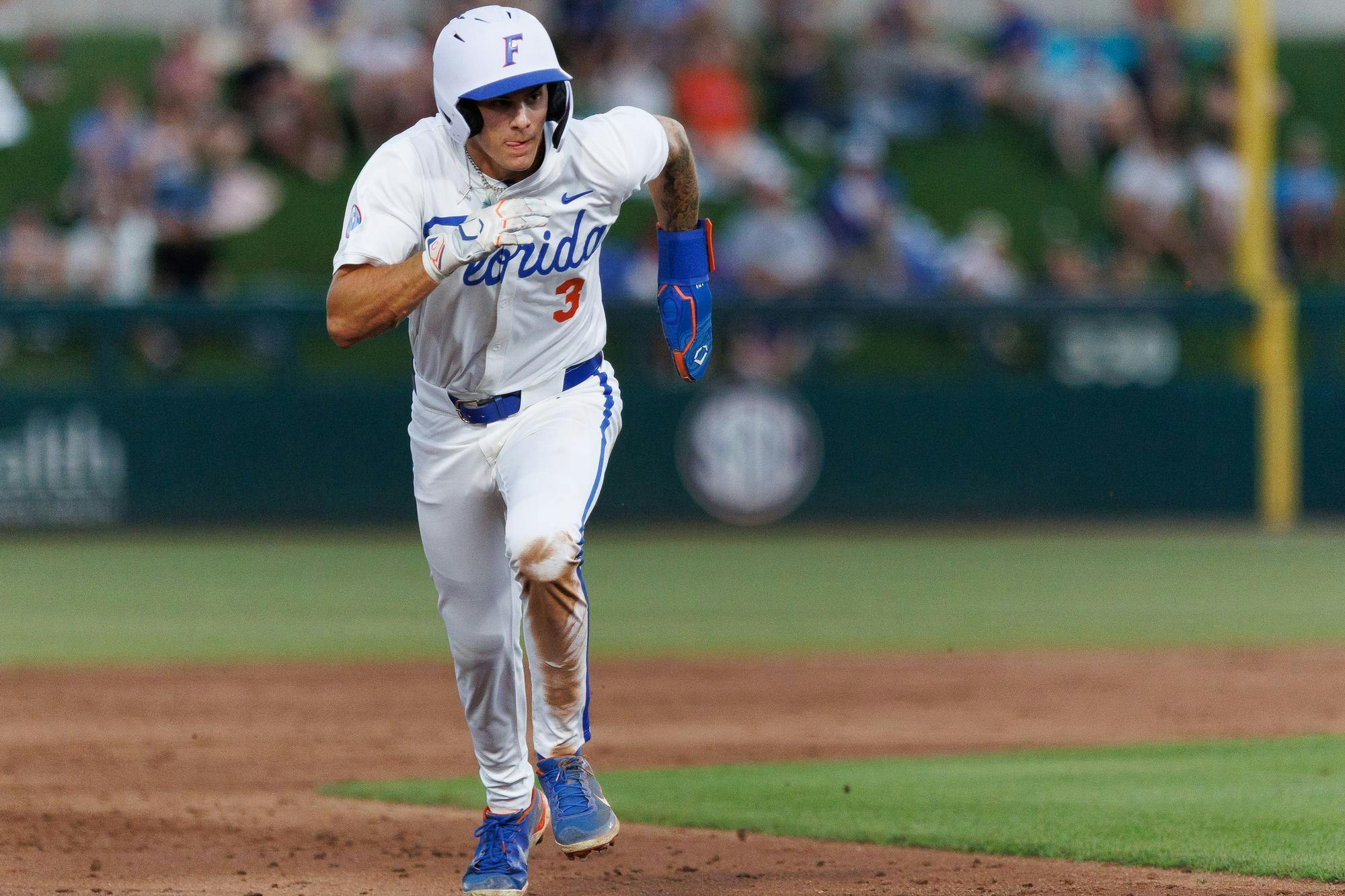 Florida outfielder Kyle Jones (3) runs to third base during an NCAA baseball game against Florida State University, Tuesday, March 10, 2026, in Gainesville, Fla.
