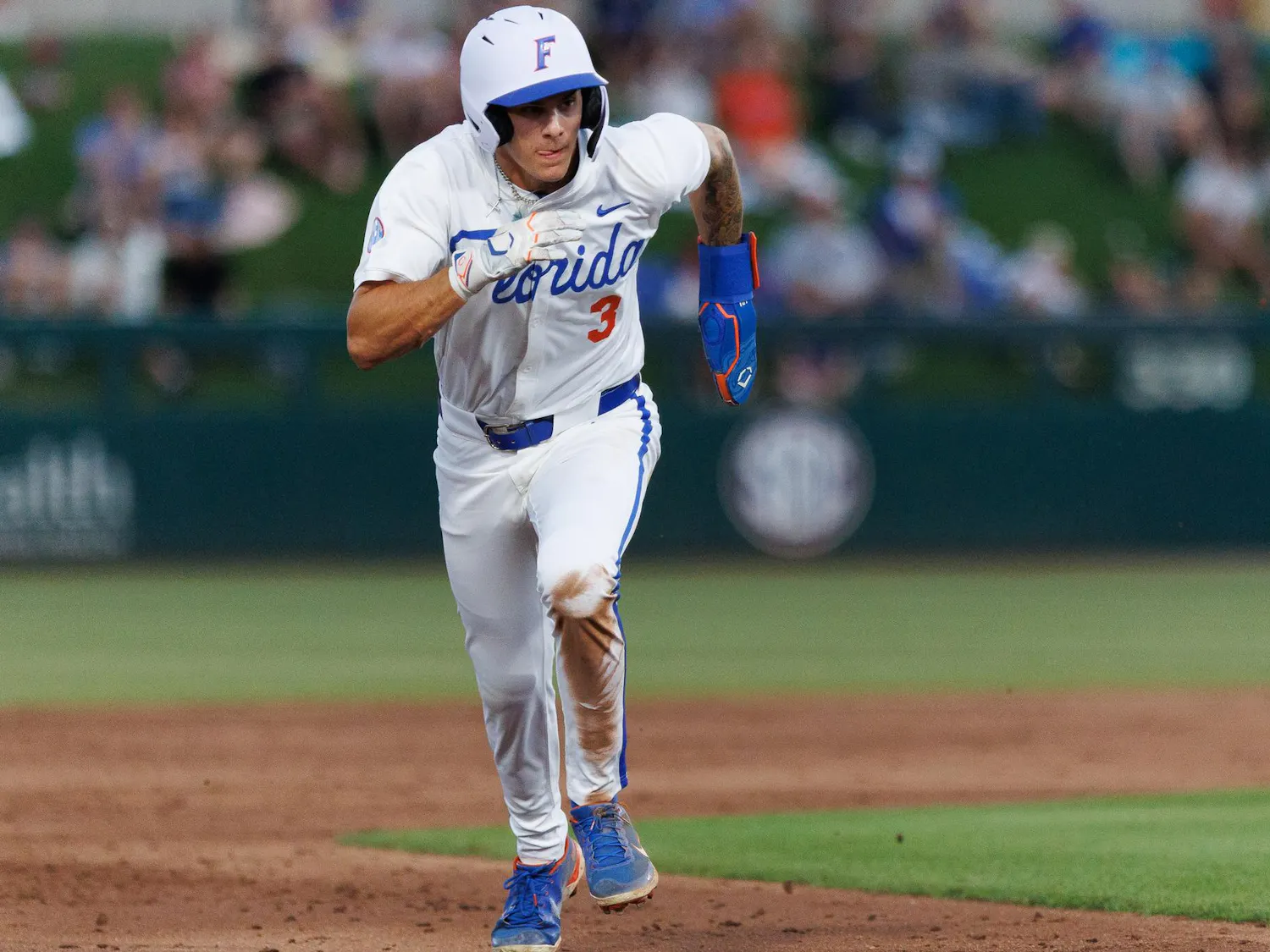 Florida outfielder Kyle Jones (3) runs to third base during an NCAA baseball game against Florida State University, Tuesday, March 10, 2026, in Gainesville, Fla.