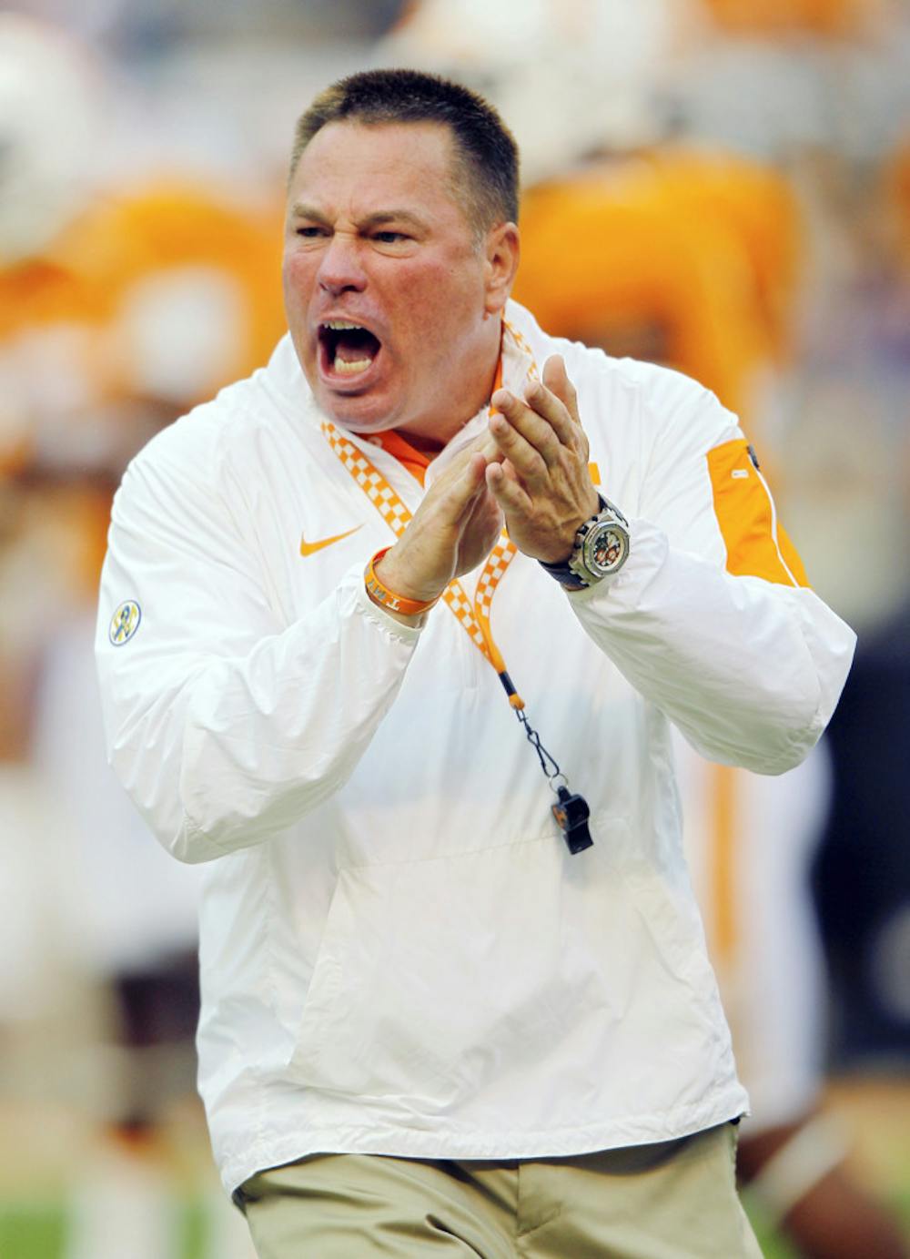 <p>Tennessee head coach Butch Jones yells to his players during warmups before an NCAA college football game against Western Carolina, Saturday, Sept. 19, 2015, in Knoxville, Tenn.</p>