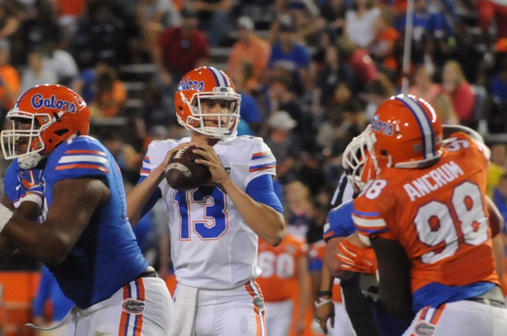 Quarterback Feleipe Franks drops back to pass during the Orange &amp; Blue Debut on April 8, 2016, at Ben Hill Griffin Stadium.