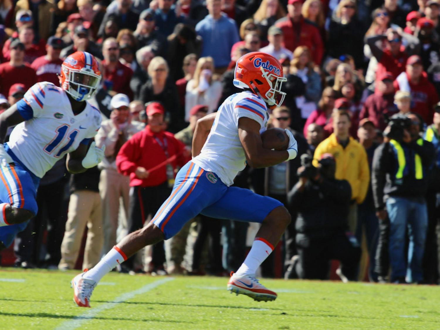 Cornerback CJ Henderson (right) exited Saturday’s game against Georgia with a lower back injury. Coach Dan Mullen said the sophomore didn’t sustain any structural damage.