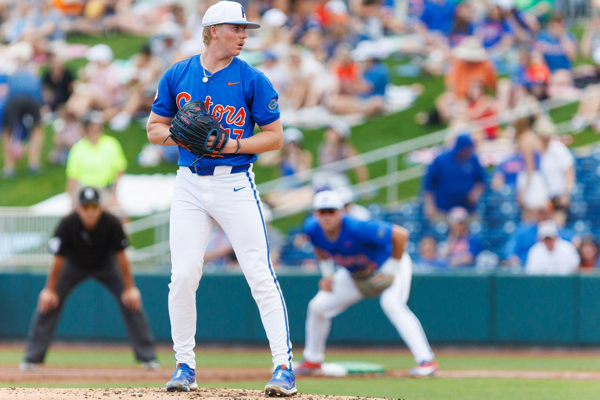 Florida Gators right handed pitcher Aidan King starts his windup during an NCAA Baseball game against High Point, Saturday, March 7, 2026, in Gainesville, Fla.