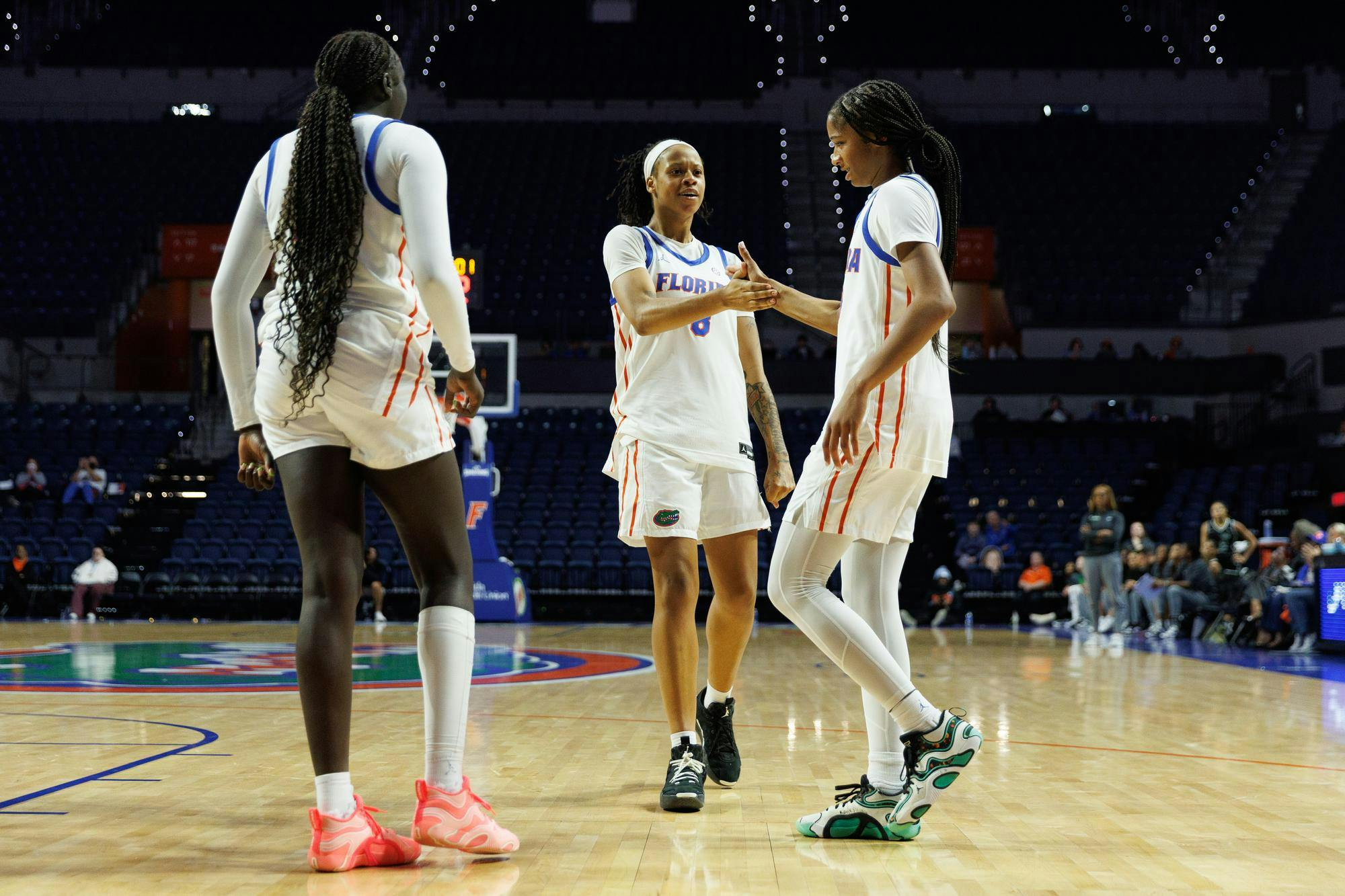 Florida guard/forward Me'Arah O'Neal (8) celebrates with Florida guard Laila Reynolds (13) during the second half of a NCAA college basketball game against Jacksonville, Monday, Nov. 10, 2025, in Gainesville, Fla.