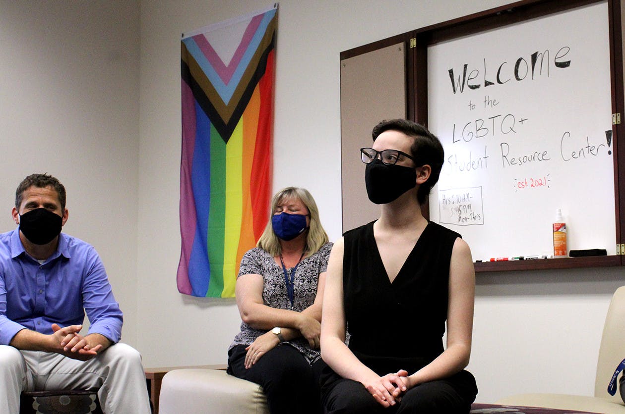Elisabeth Eder (right), 21, a Santa Fe sociology sophomore, sits at the grand opening for the college&#x27;s LGBTQ resource center on Monday, March 29, 2021. Eder started a petition to open the center last February.