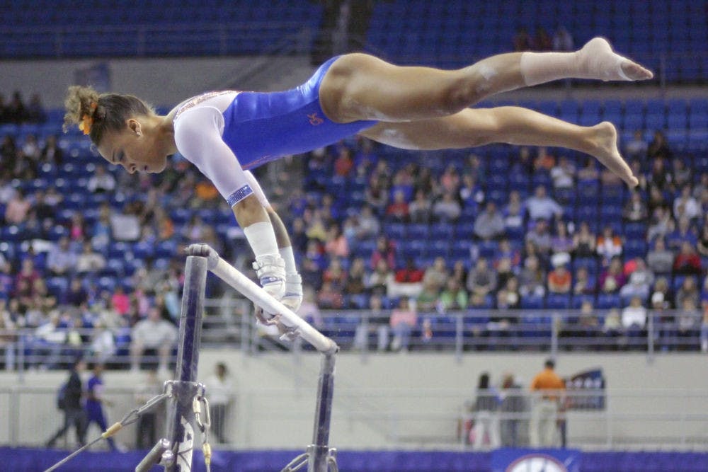 Kytra Hunter performs on the uneven parallel bars during Florida's win against Missouri on Feb. 13.