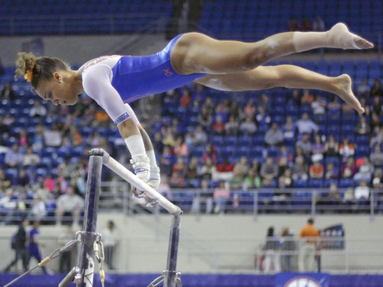Kytra Hunter performs on the uneven parallel bars during Florida's win against Missouri on Feb. 13.