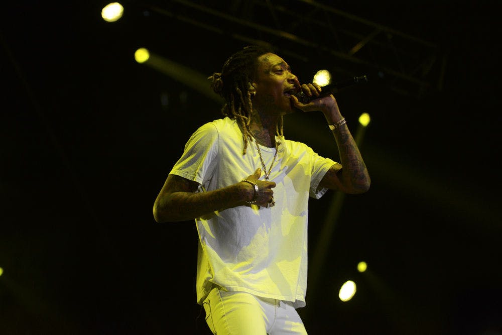 <p>Rapper Wiz Khalifa performs his hit song, "Black and Yellow," to a sold-out crowd in the Stephen C. O'Connell Center on Feb. 11, 2016.</p>