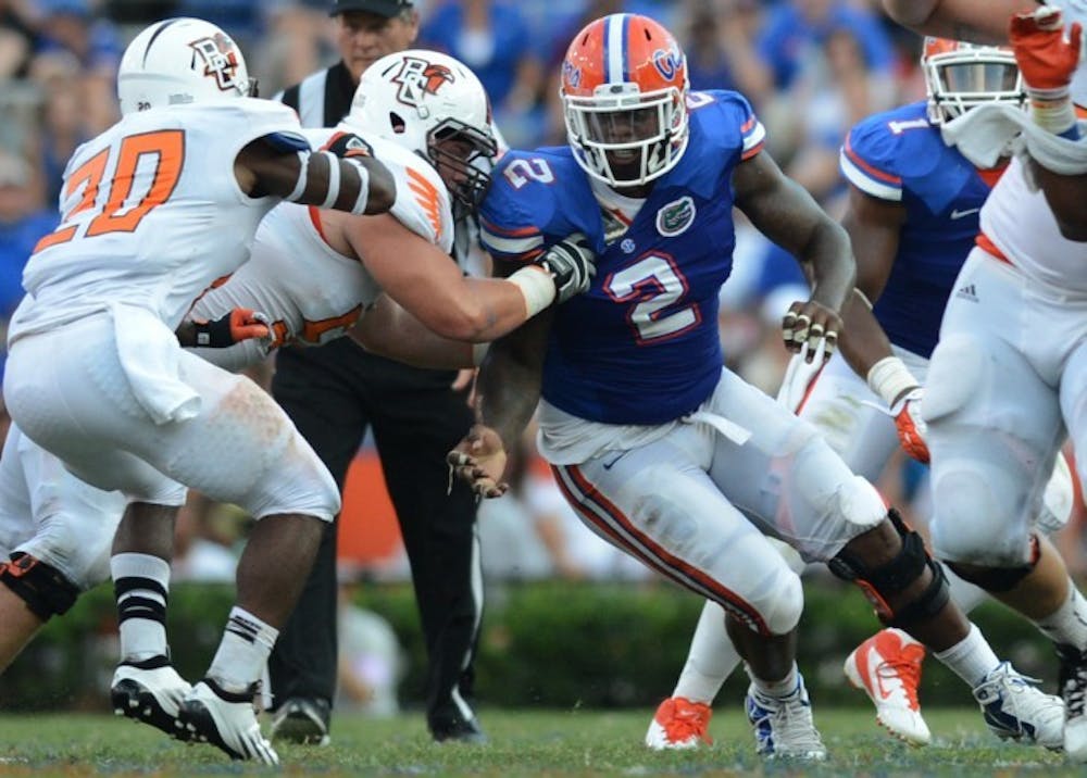 <p>Junior defensive end Dominique Easley (2) rushes the passer during Florida's 27-14 win against Bowling Green on Sept. 1 at Ben Hill Griffin Stadium. UF defensive coordinator said Easley, who was nursing a knee injury, is ready to go on Saturday against LSU.</p>