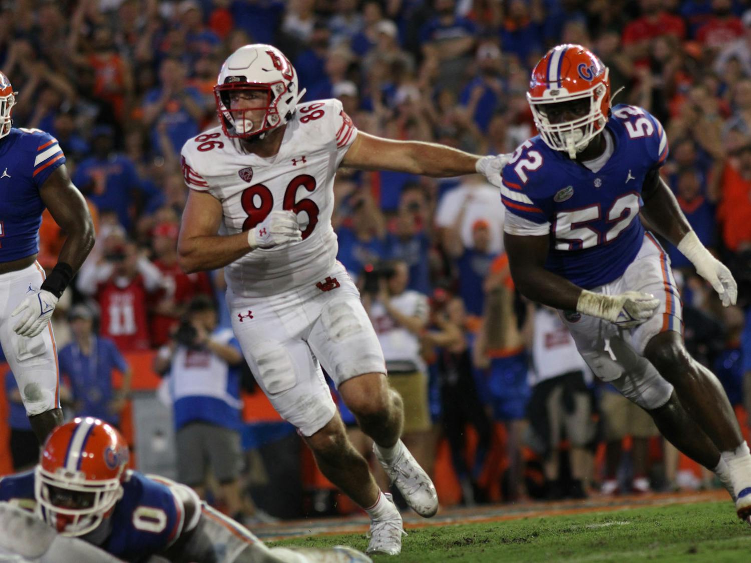 Former UF linebacker Antwaun Powell-Ryland Jr. and former Utah tight end Dalton Kincaid compete in a play in the Gators' 29-26 victory Saturday, Sept. 3, 2023. 