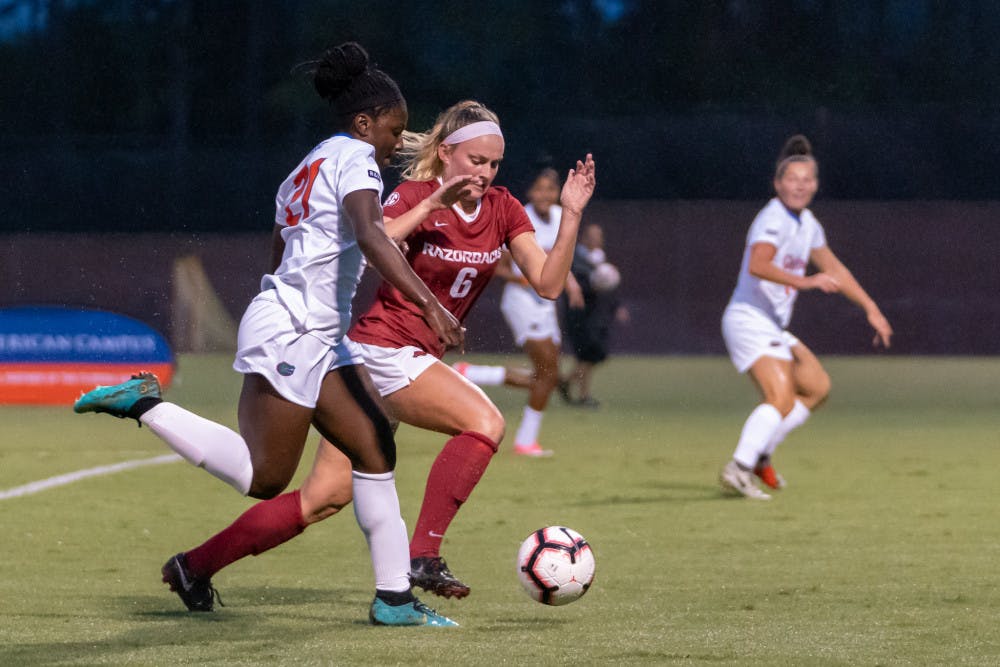 Forward Deanne Rose (21) had Florida's greatest scoring chance in the 87th minute against Arkansas in the SEC Tournament semifinals. She struck it right at the keeper, and Arkansas went on to win in the first minute of overtime. 