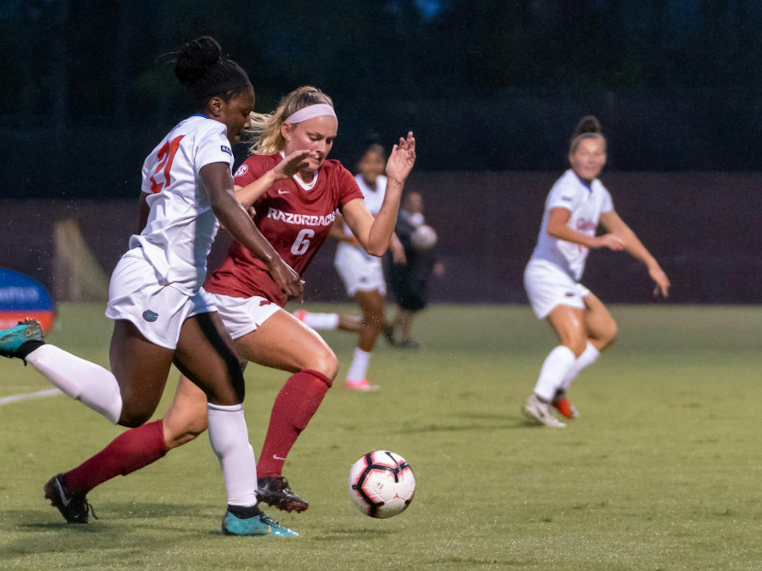 Forward Deanne Rose (21) had Florida's greatest scoring chance in the 87th minute against Arkansas in the SEC Tournament semifinals. She struck it right at the keeper, and Arkansas went on to win in the first minute of overtime.
