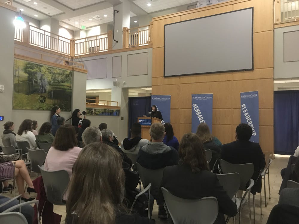 Speaker Lisa Rowe urges the crowd to be aware of their surroundings and report possible cases of human trafficking. Rowe is vice president of Selah Freedom, a non-profit organization dedicated to helping victims of sexual abuse.