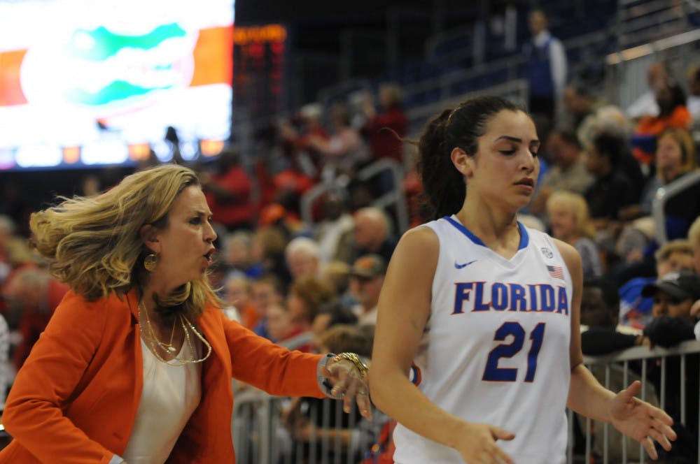 UF women’s basketball coach Amanda Butler calls out to guard Eleanna Christinaki at the end of the first half of Florida’s 71-61 loss to Georgia on Jan. 14, 2016, in the O’Connell Center.