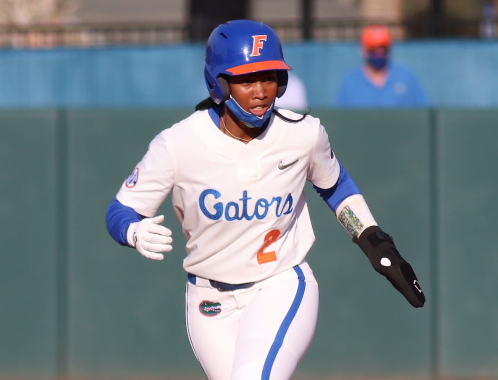 <p>Cheyenne Lindsey runs the bases March 3 against Florida State.  The senior hit a walkoff grandslam against Michigan Saturday to give UF a 4-0 win. </p>