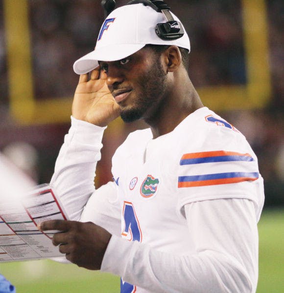 Tyler Murphy speaks on the sideline during Florida’s 19-14 loss to then-No. 10 South Carolina on Saturday in Williams-Brice Stadium.