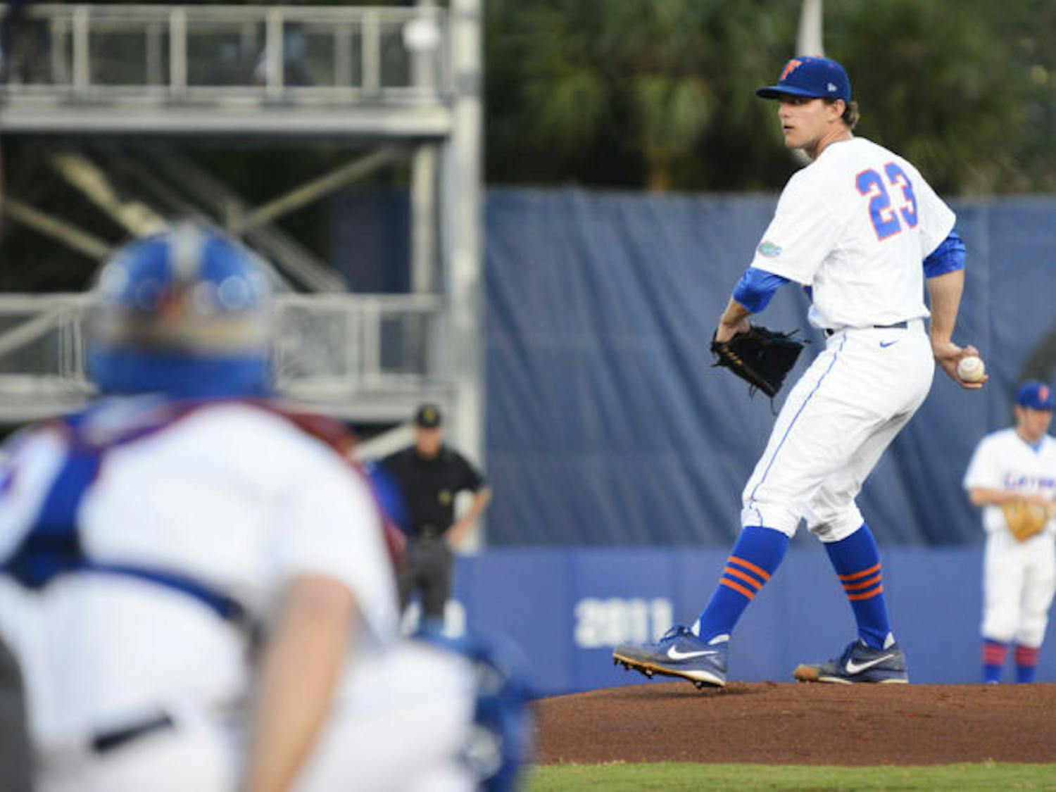 Junior starting pitcher Jonathon Crawford warms up on the mound during Florida’s 3-2 victory against South Carolina on April 11 at McKethan Stadium. Crawford gave up four runs in four innings against Auburn on Friday.