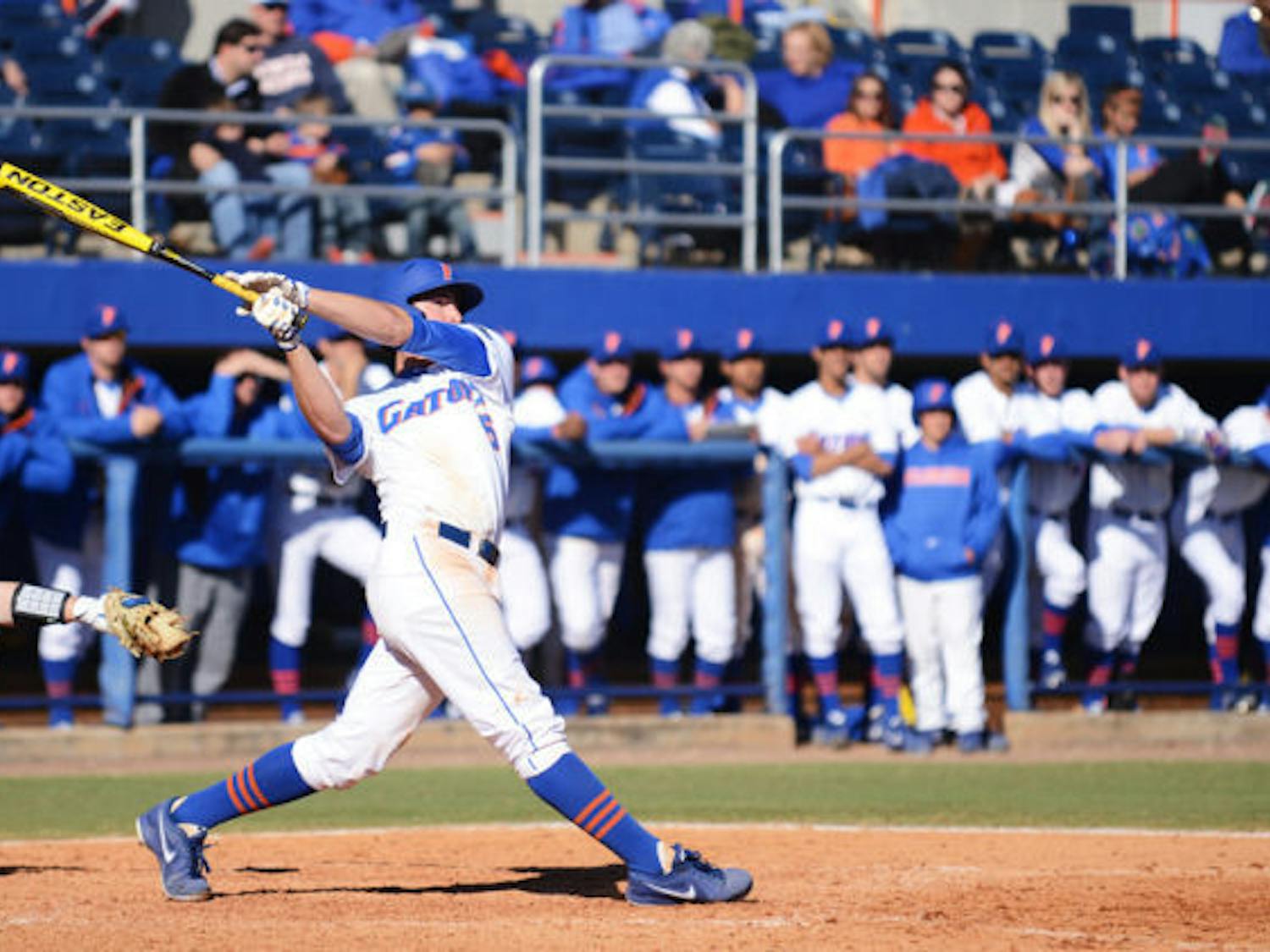 Sophomore first baseman Zack Powers hits the second of his two grand slams during Florida’s 16-5 win against Duke on Sunday at McKethan Stadium. Powers, who missed 2012 with a torn labrum, finished the Gator’ series-clinching victory with nine RBI.