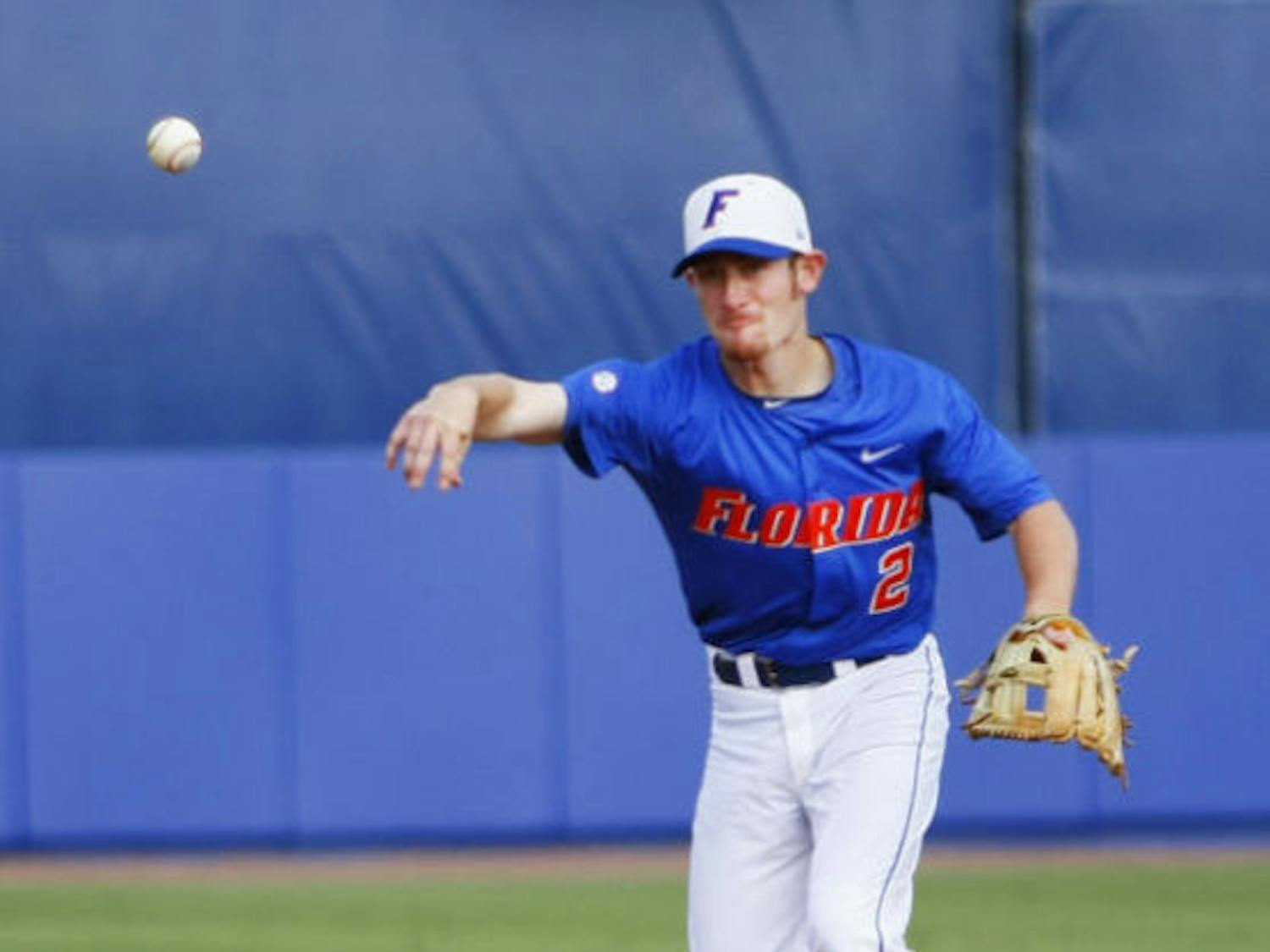 Sophomore second baseman Casey Turgeon throws the ball to first base during Florida’s 4-2 win against Florida Gulf Coast on Mar. 9, 2012, at McKethan Stadium. Turgeon had four hits and three RBI during a&nbsp;6-4 victory against Indiana on Saturday.
