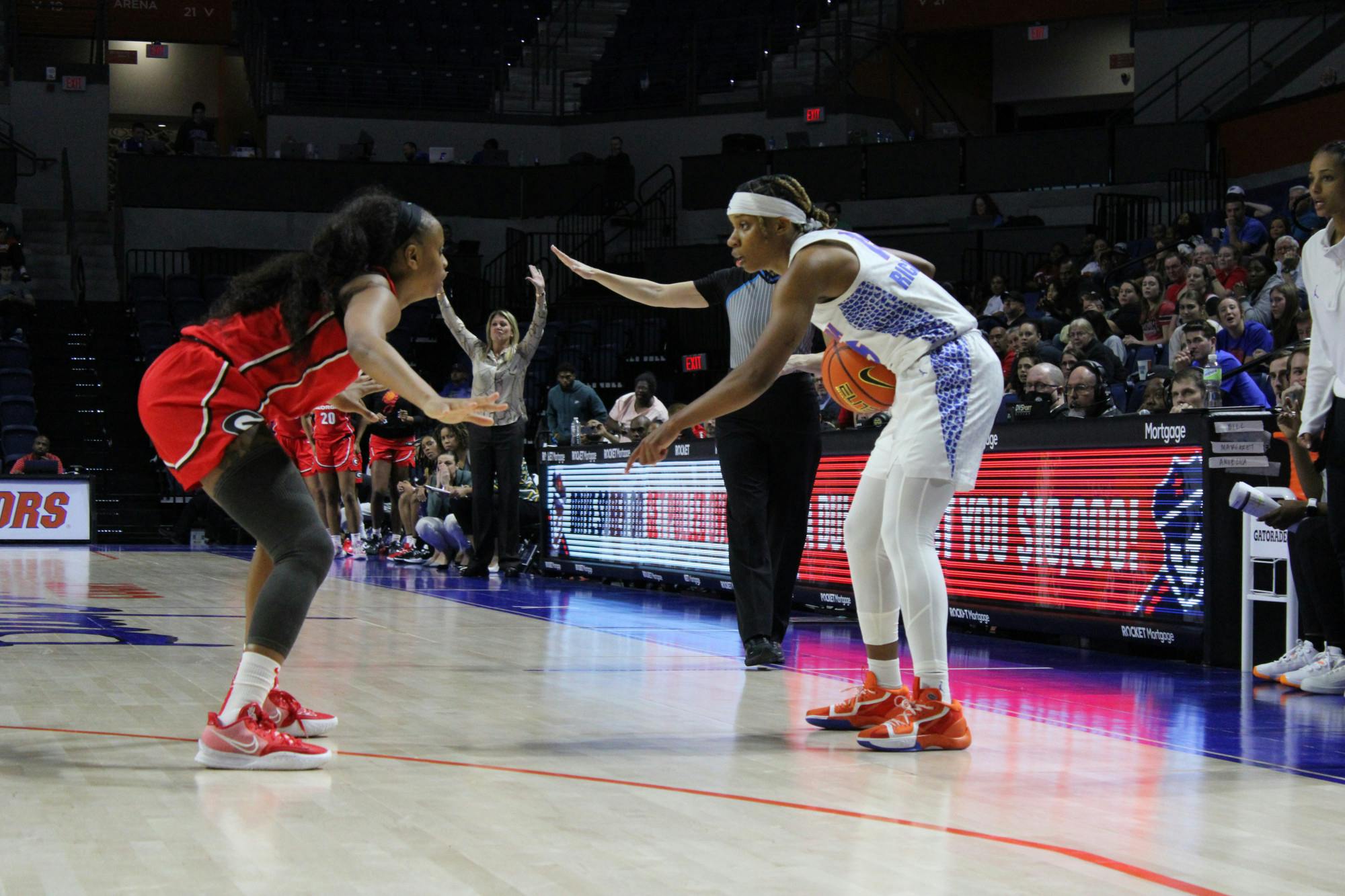 Florida guard Nina Rickards sizes up a Georgia defender in the Gators' 82-77 loss to the Bulldogs Sunday, Jan. 8, 2023.
