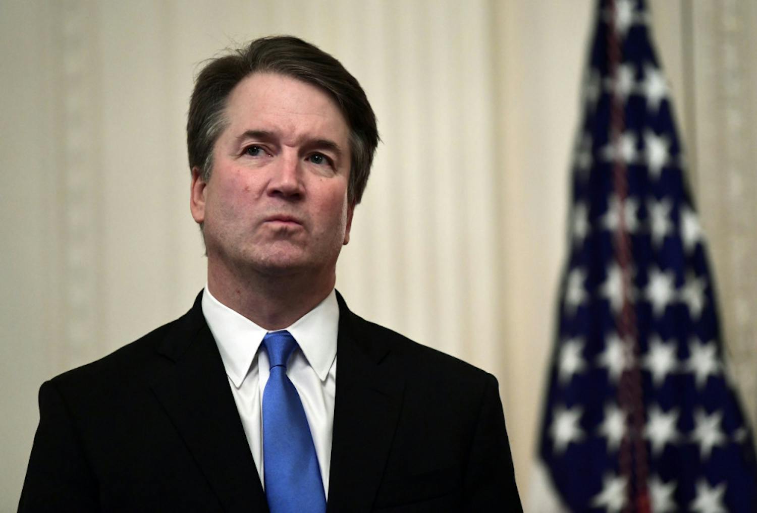 In this Oct. 8, 2018 photo, Supreme Court Justice Brett Kavanaugh stands before a ceremonial swearing-in in the East Room of the White House in Washington. At least two Democratic presidential candidates, Kamala Harris and Kamala Harris are calling for the impeachment of Supreme Court Justice Brett Kavanaugh in the face of a new, uninvestigated, allegation of sexual impropriety when he was in college. (AP Photo/Susan Walsh, File)