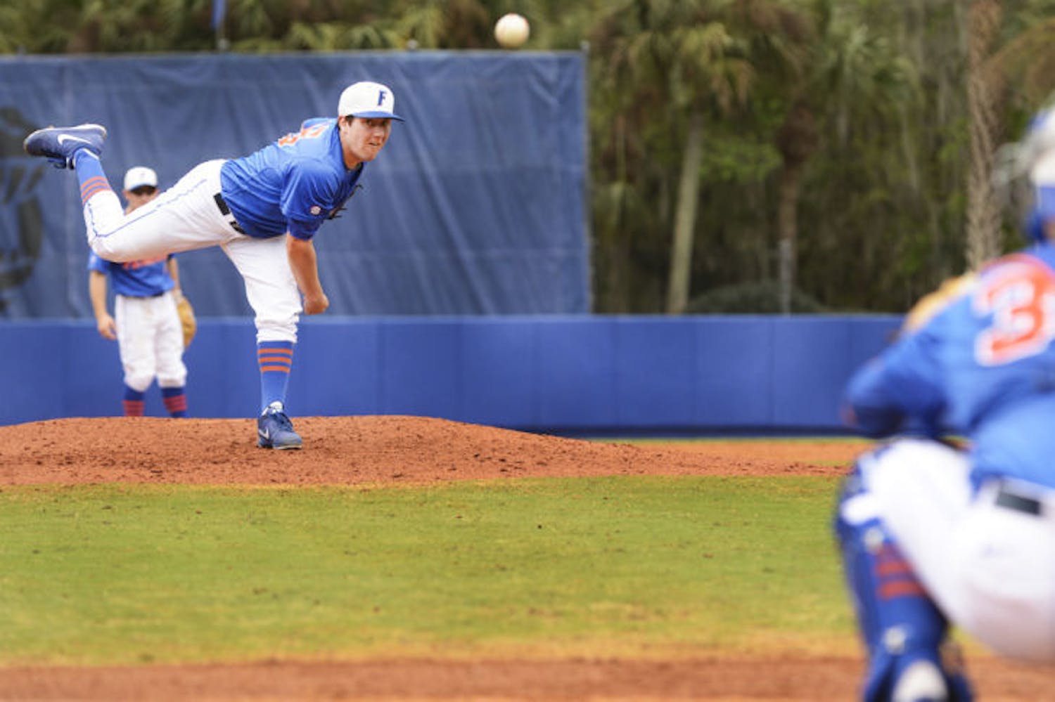 Sophomore Johnny Magliozzi warms up between innings during Florida’s 7-4 loss to Florida Gulf Coast on Feb. 24 at McKethan Stadium. Magliozzi and the Gators were eliminated from the NCAA Bloomington Regional on Saturday.&nbsp;