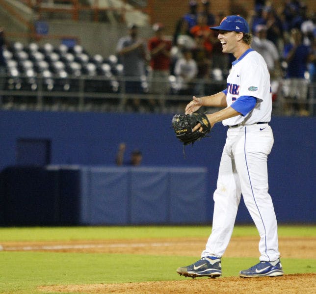 Jonathon Crawford celebrates after pitching a no-hitter against Bethune-Cookman on June 1 at McKethan Stadium.
