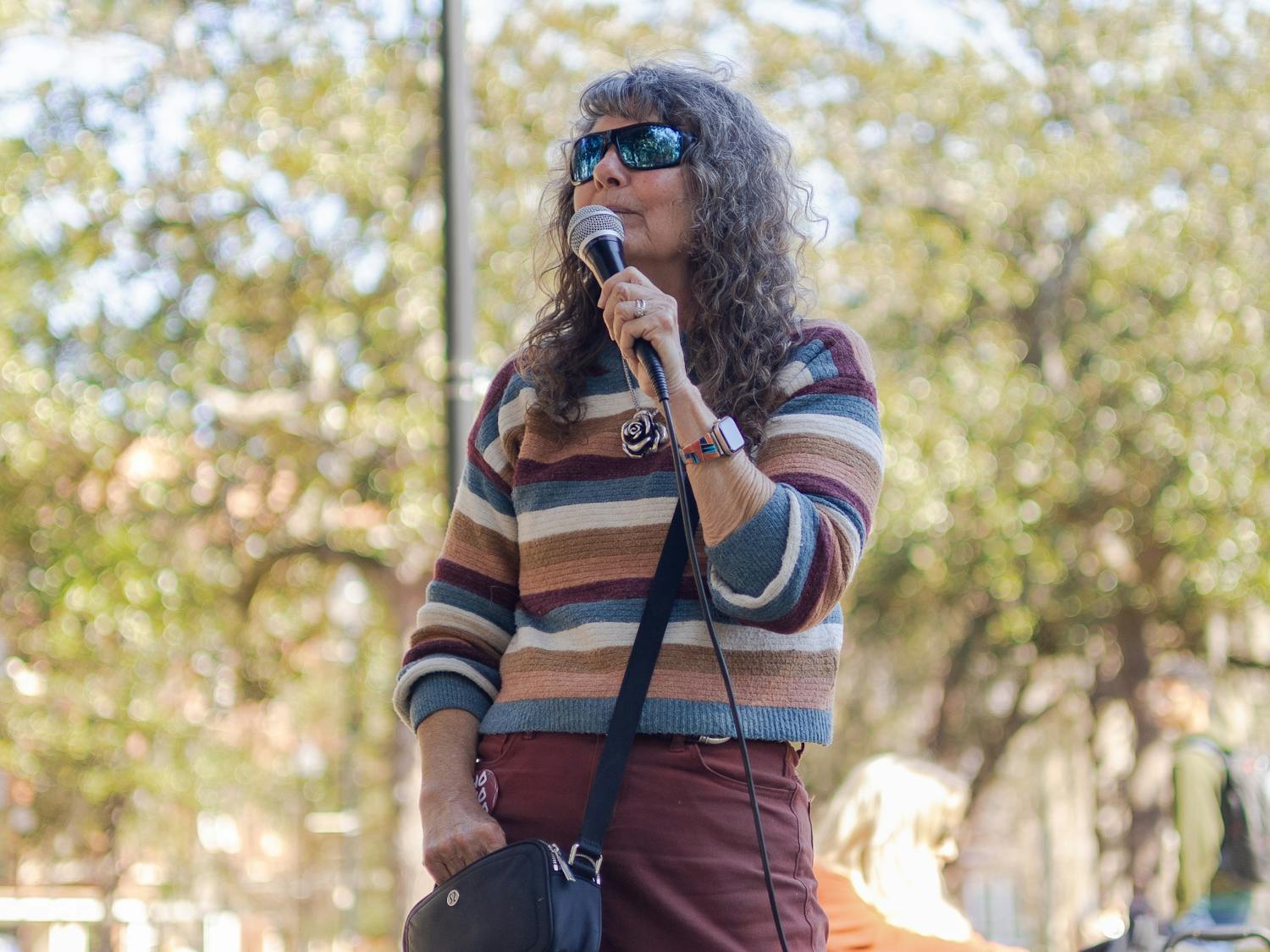 Cindy Smock, "Sister Cindy," an evangelical street preacher with over 425,000 TikTok followers yelling at a crowd of UF students on Tuesday, Jan. 30, 2024. 