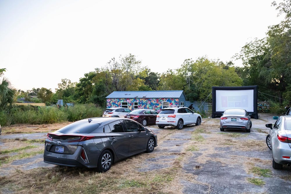Cars file into Gainesville’s only drive-in theater on Thursday, Sept. 18, 2025.