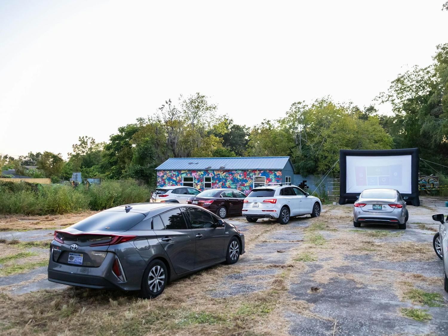 Cars file into Gainesville’s only drive-in theater on Thursday, Sept. 18, 2025.