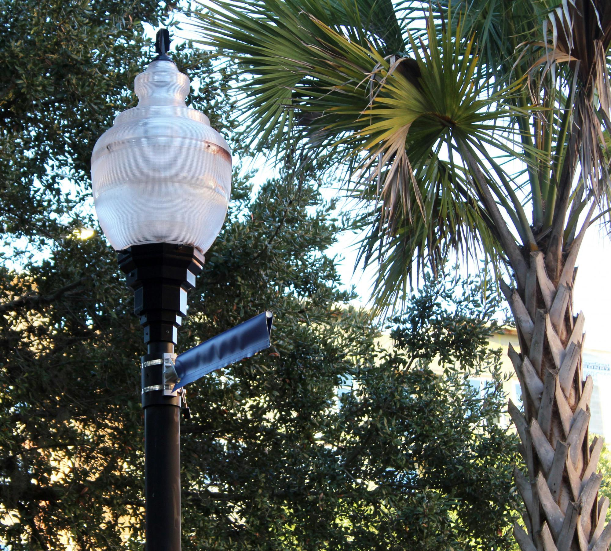 The remnants of a top 5 banner is seen on Buckman Drive on Thursday, Oct. 14, 2021.