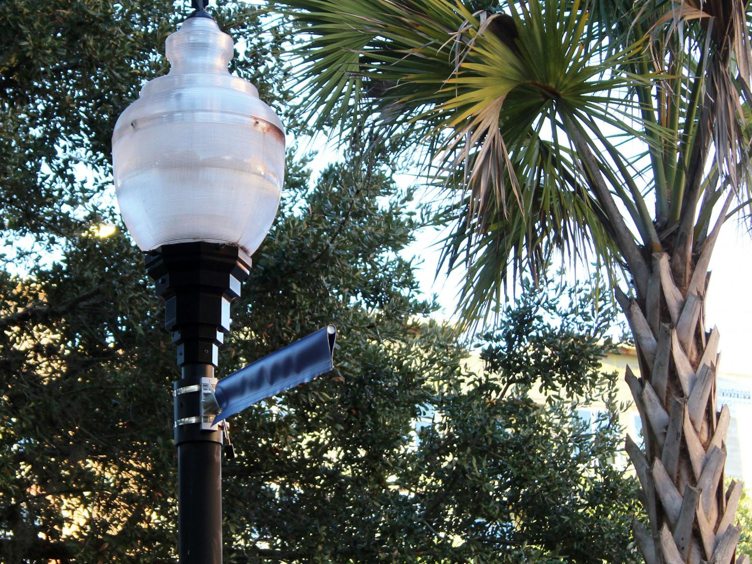 The remnants of a top 5 banner is seen on Buckman Drive on Thursday, Oct. 14, 2021.