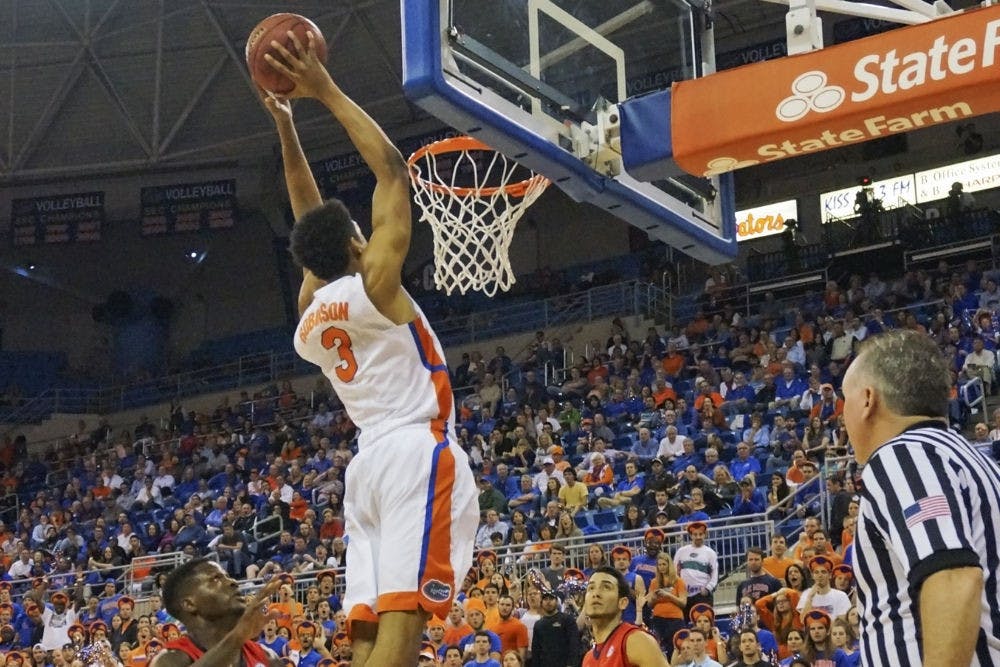 <p>Devin Robinson dunks during Florida's 62-61 loss to Ole Miss on Thursday in the O'Connell Center.</p>