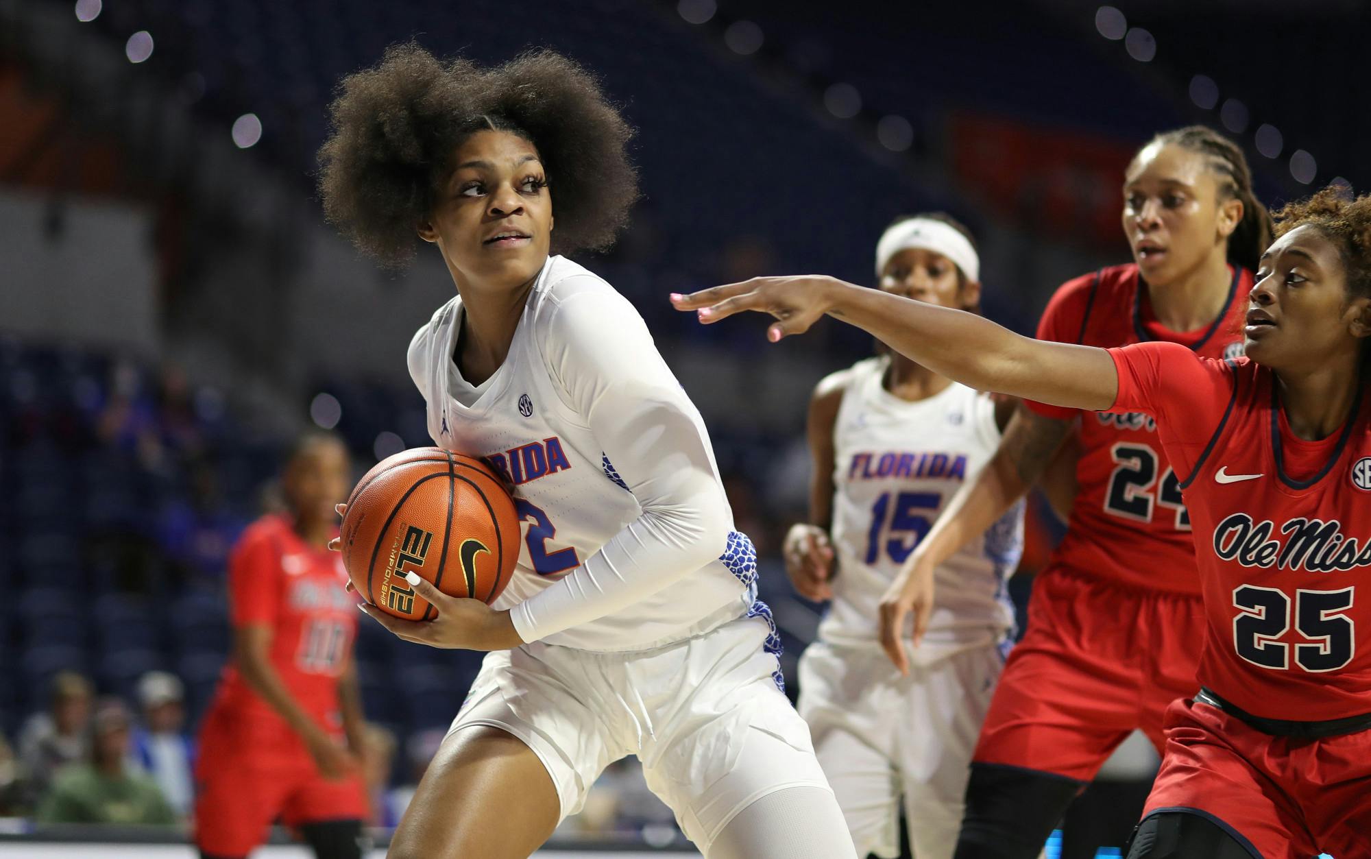 Tatyana Wyche protects the ball from a swarm of Ole Miss players looking to snatch it out of her hands.