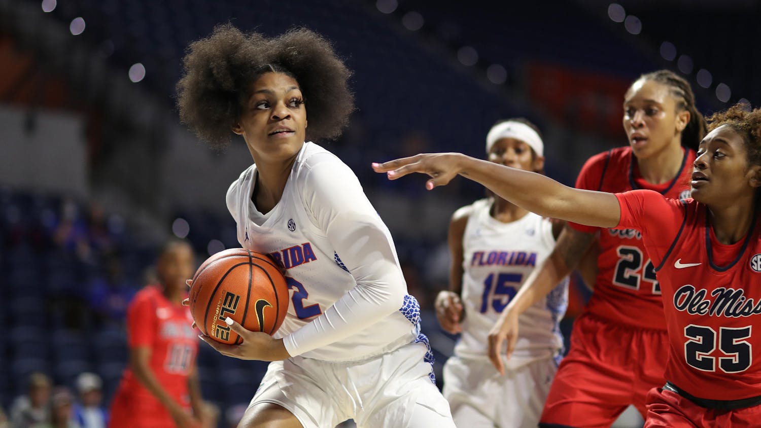 Tatyana Wyche protects the ball from a swarm of Ole Miss players looking to snatch it out of her hands.