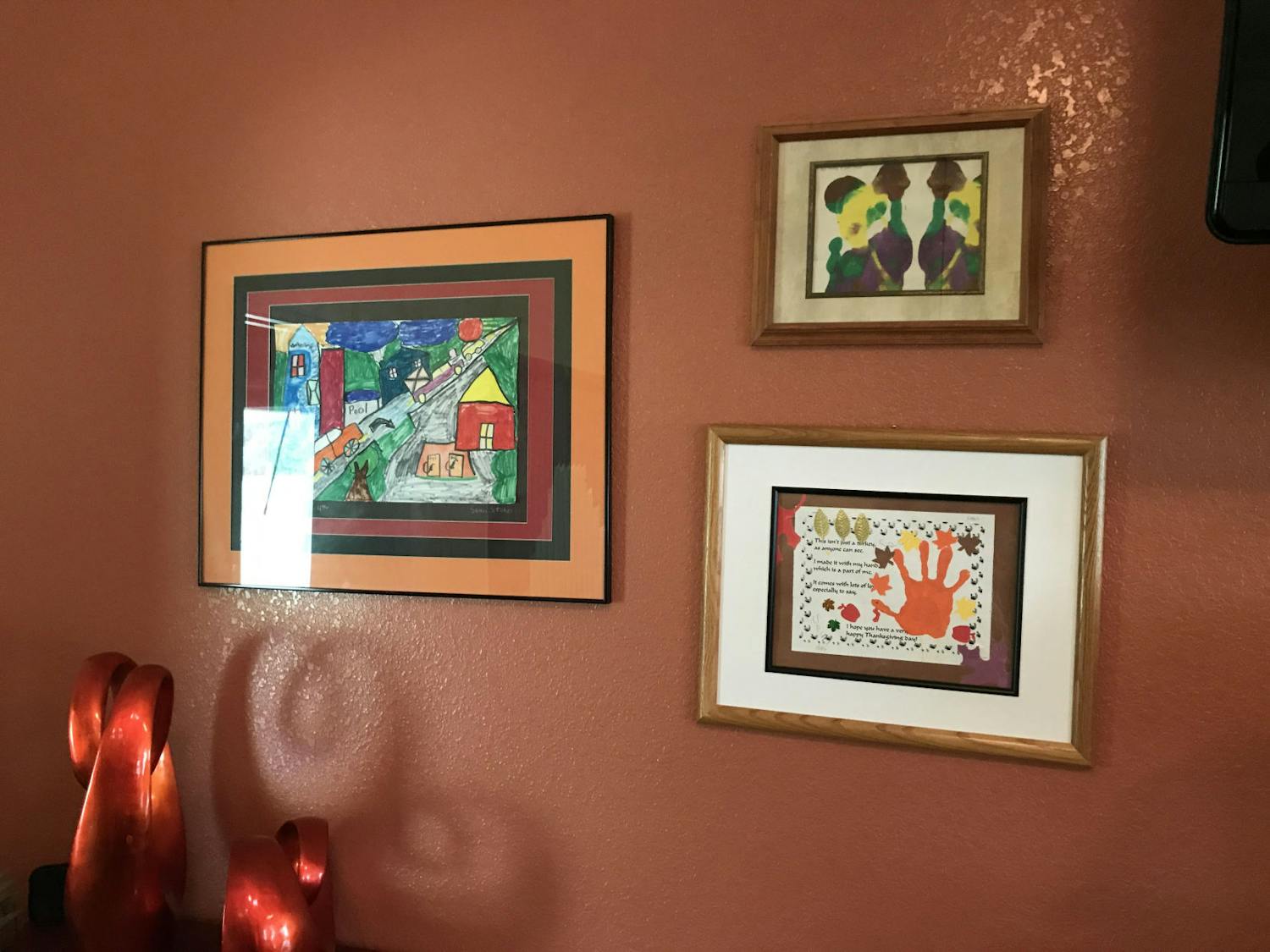 Sean’s paintings hang on the wall in the family’s living room. When he was in fourth grade, Sean’s art was displayed in an exhibition at the Thomas Center in Gainesville.