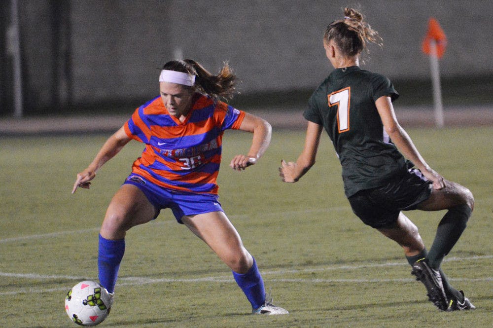 <p>Betsy Middleton (36) dribbles the ball during Florida's 3-0 win against Miami on Aug. 22 at James G. Pressly Stadium.</p>