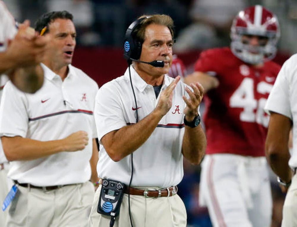 <p>Alabama coach Nick Saban applauds on the sideline during the first half of an NCAA college football game against Southern California on Saturday, Sept. 3, 2016, in Arlington, Texas. (AP Photo/Tony Gutierrez)</p>