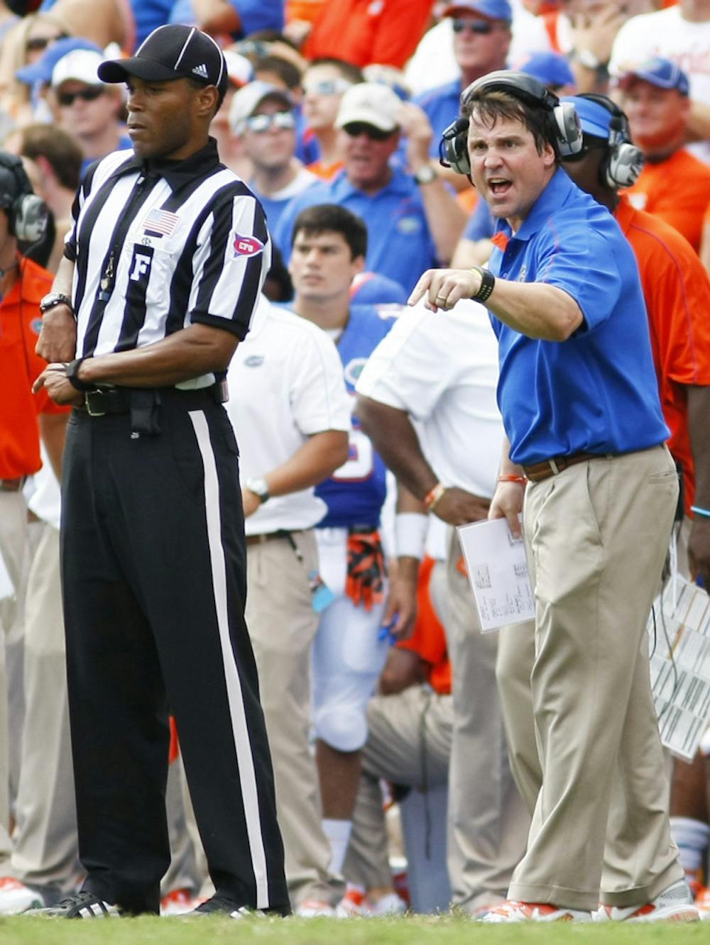 <p>Florida head coach Will Muschamp exchanges words with a referee during a game against Kentucky at Ben Hill Griffin Stadium on Saturday. Although the Gators defeated the Wildcats 38-0, Muschamp said on Monday that Florida has room for improvement.</p>