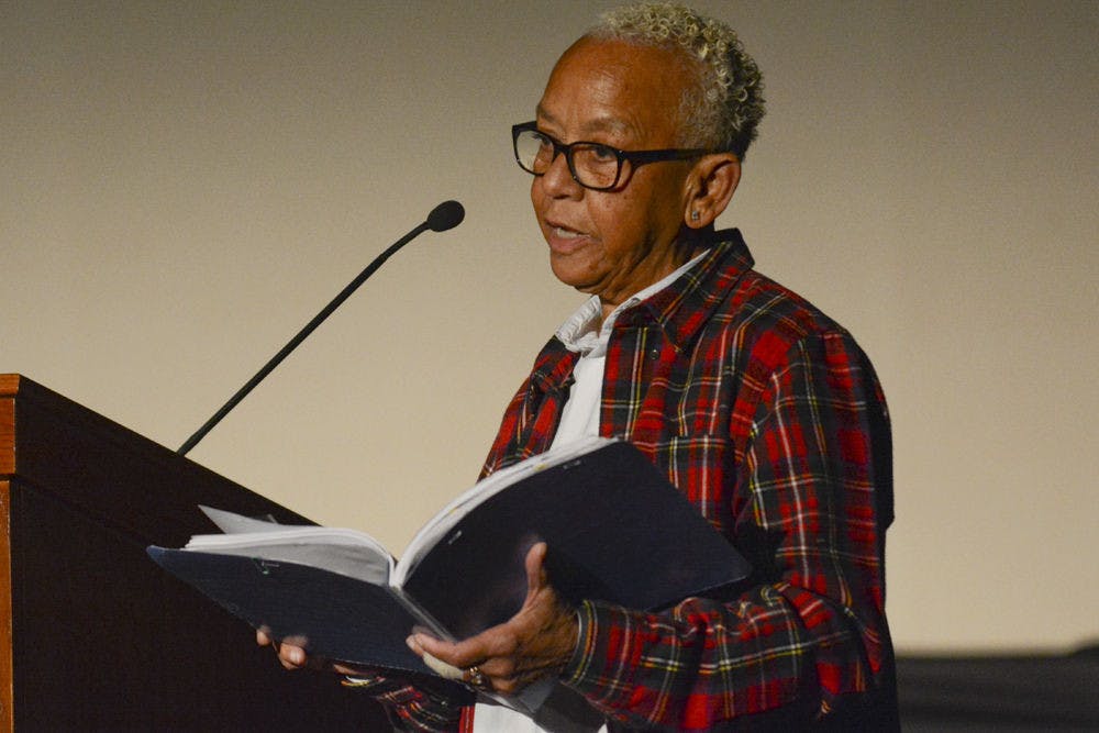<p>Poet and writer Nikki Giovanni reads her poem titled “Note to the South: You Lost,” to a packed audience in the Reitz Union Grand Ballroom on Tuesday night. Giovanni spoke on black history, racism in the U.S. and other topics.</p>