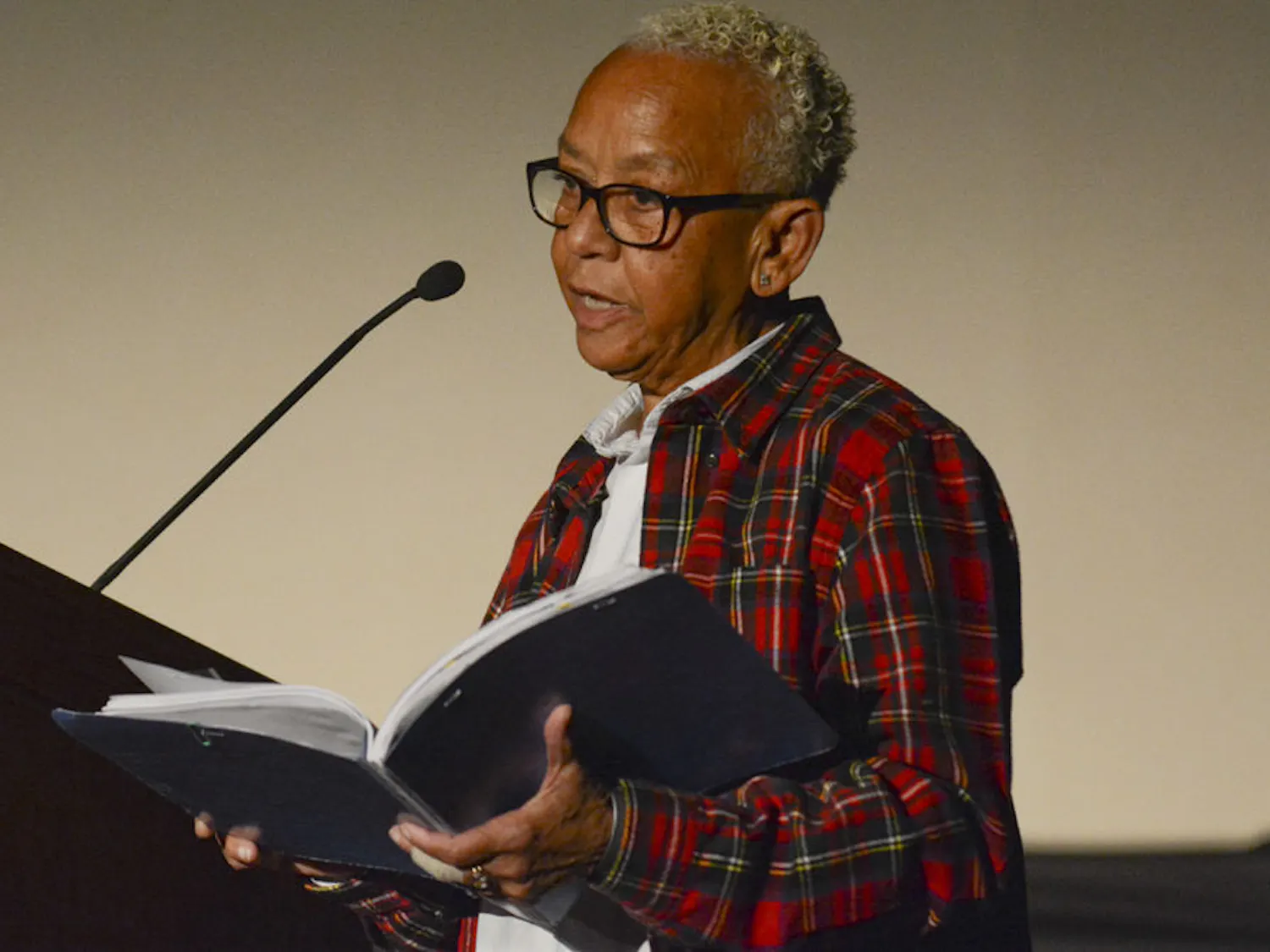 Poet and writer Nikki Giovanni reads her poem titled “Note to the South: You Lost,” to a packed audience in the Reitz Union Grand Ballroom on Tuesday night. Giovanni spoke on black history, racism in the U.S. and other topics.