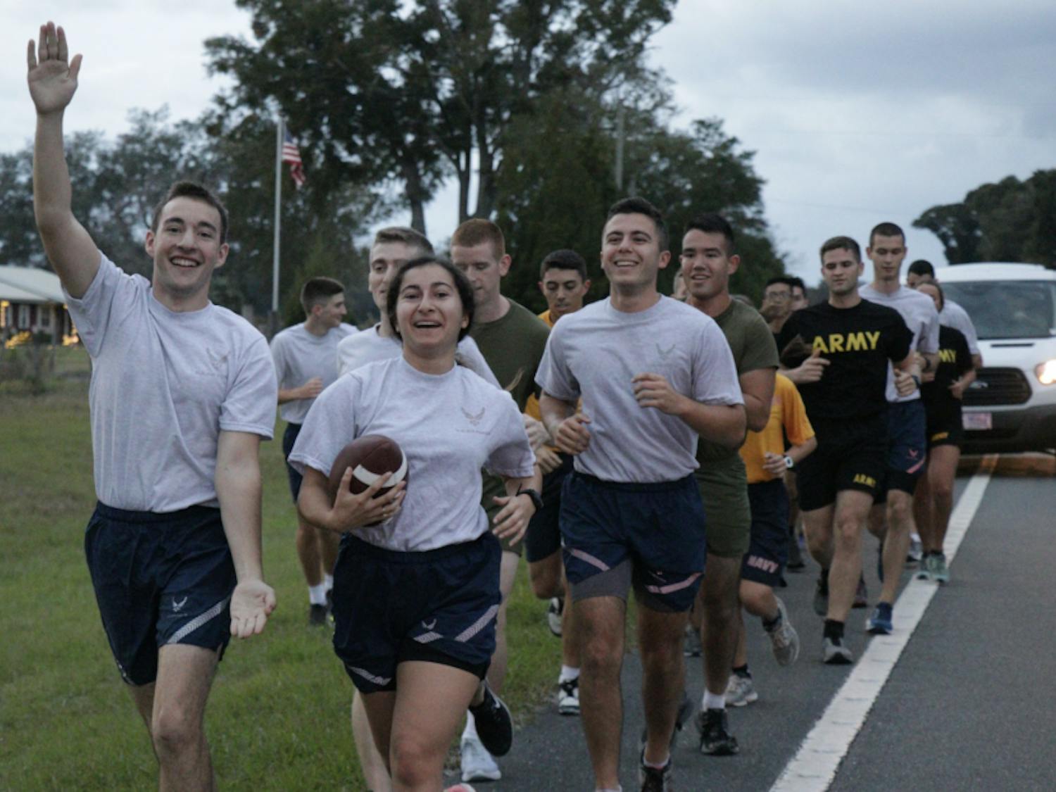 


UF Air Force ROTC cadets Jake Gold (left), Destiny Cepero, and Jonathan Toledo hold the game ball during the relay on their way to Gainesville.



