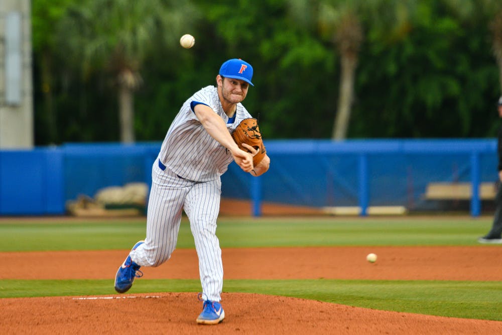 UF pitcher Tyler Dyson (3-2) lasted 3.2 innings in Game 1 of Saturday's doubleheader against Ole Miss. He gave up five runs, none earned, on four hits and four walks. 