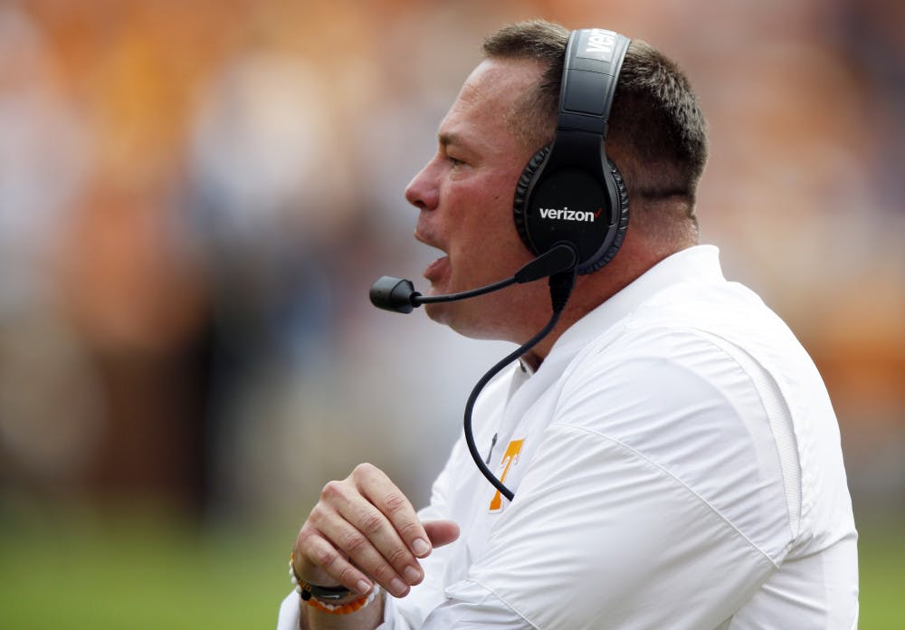<p>Tennessee head coach Butch Jones yells to a players in the first half of an NCAA college football game against South Carolina, Saturday, Oct. 14, 2017, in Knoxville, Tenn. (AP Photo/Wade Payne)</p>