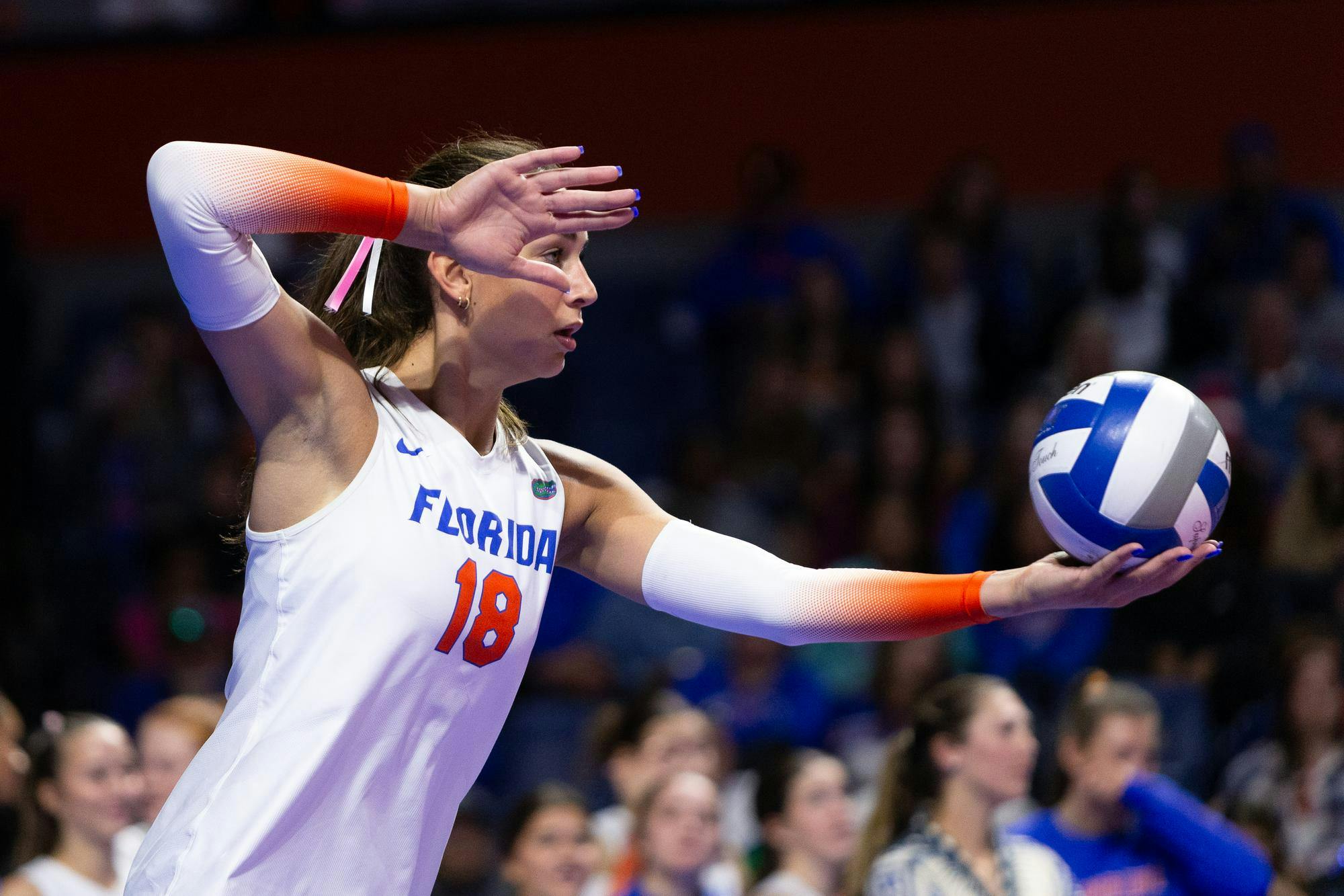Florida Gators outside hitter/right side hitter Kennedy Martin (18) prepares to serve the ball during the Gators’ match vs. the UCF Knights at Exactech Arena at the Stephen C. O'Connell Center on Saturday, Nov 23, 2024.