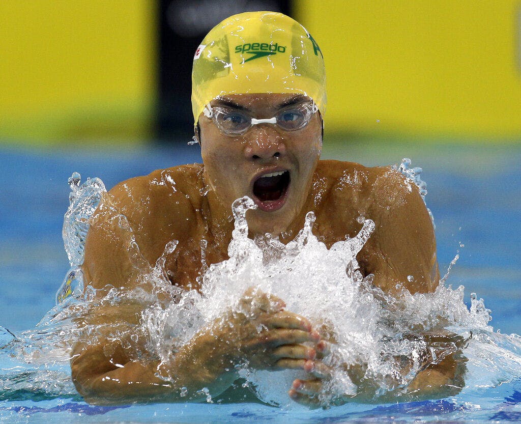 FILE - In this Saturday, Dec. 18, 2010 file photo, Kenneth To from Australia swims a Men's 100 meter Individual Medley heat at the FINA Short Course Swimming World Championships in Dubai, United Arab Emirates. Kenneth To, a former swimming world championships medalist for Australia, died Tuesday March 19, 2019, after falling ill training with the University of Florida. He was aged 26. (AP Photo/Michael Sohn, File)