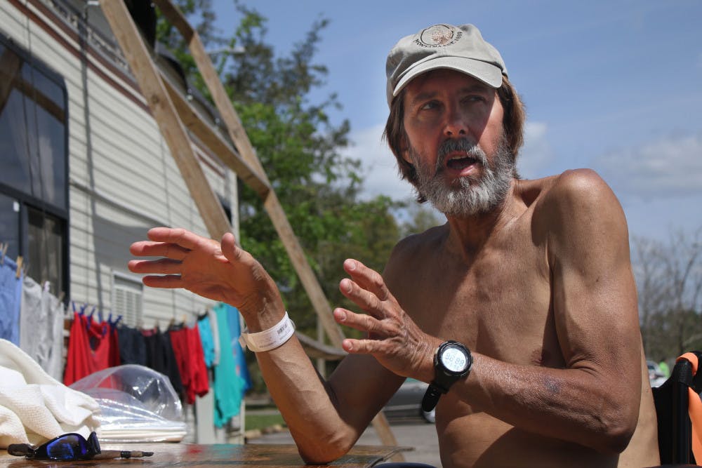 In Dignity Village, just outside the main gate of GRACE Marketplace, Mark Venzke, 62, describes his plans to renovate his motorhome so he can move out of the 6-foot tent where he currently sleeps. 