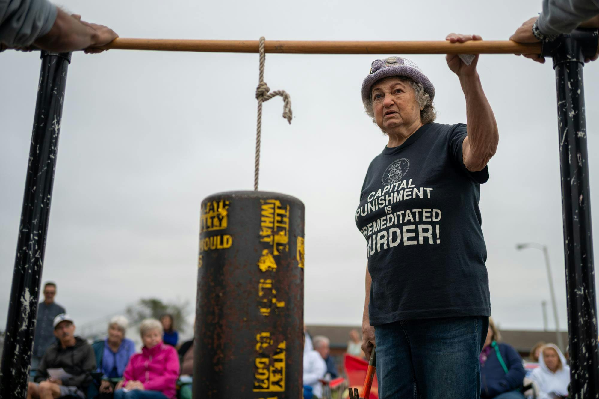 Helen Pajama bangs a hammer on a metal cylinder in solidarity of the execution of Norman Mearle Grim. Grim was executed at Florida State Prison on Tuesday, Oct. 28, 2025.