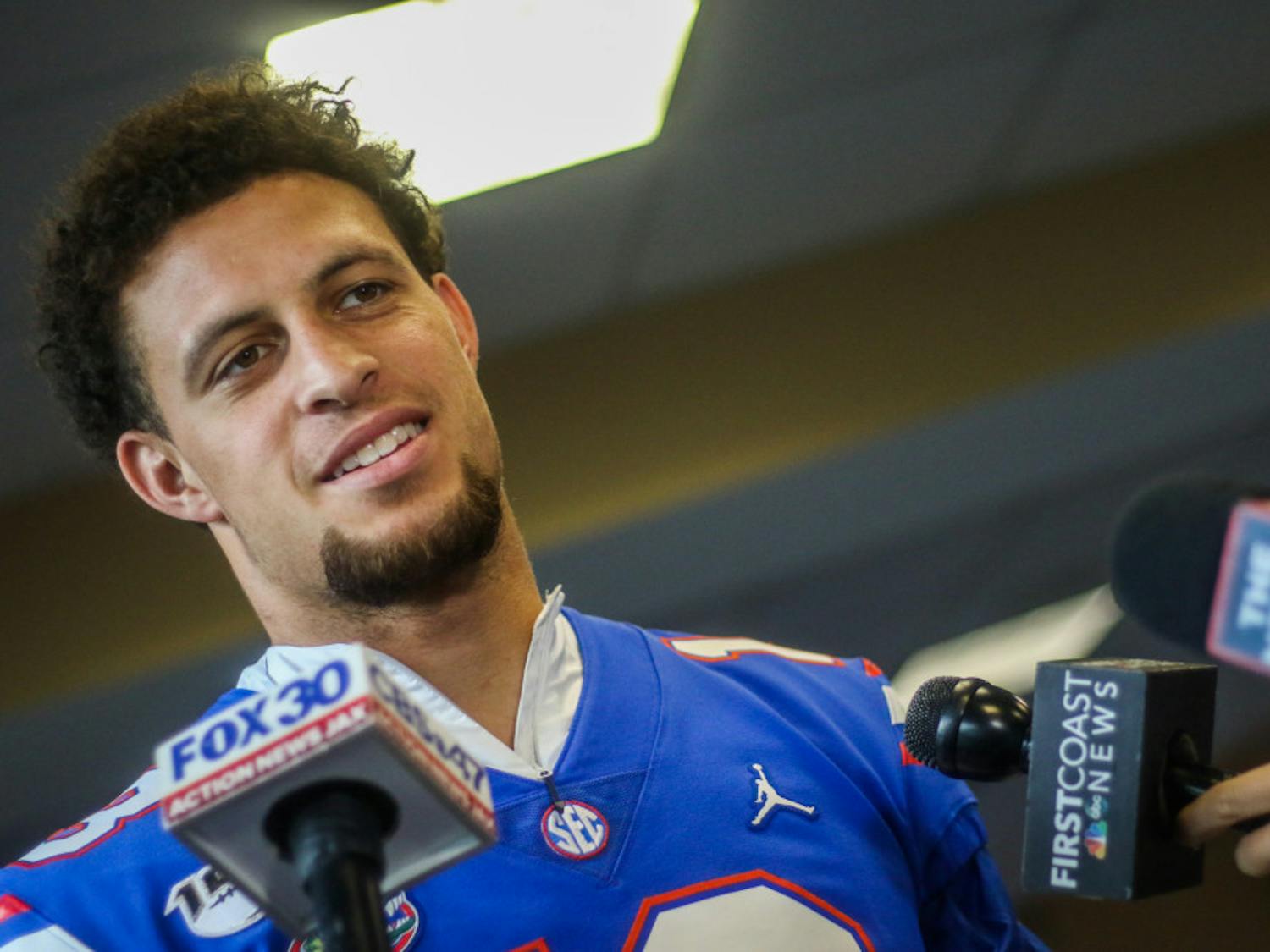 UF quarterback Feleipe Franks takes questions from reporters at football media day on Thursday.