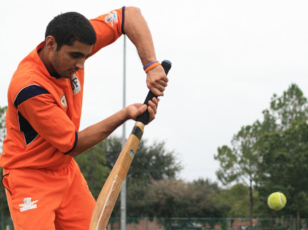 <p>Ricky Nayar, a 20-year-old civil and environmental engineering senior, practices his batting skills. His team won the Gator Cricket Club tournament this weekend.</p>
