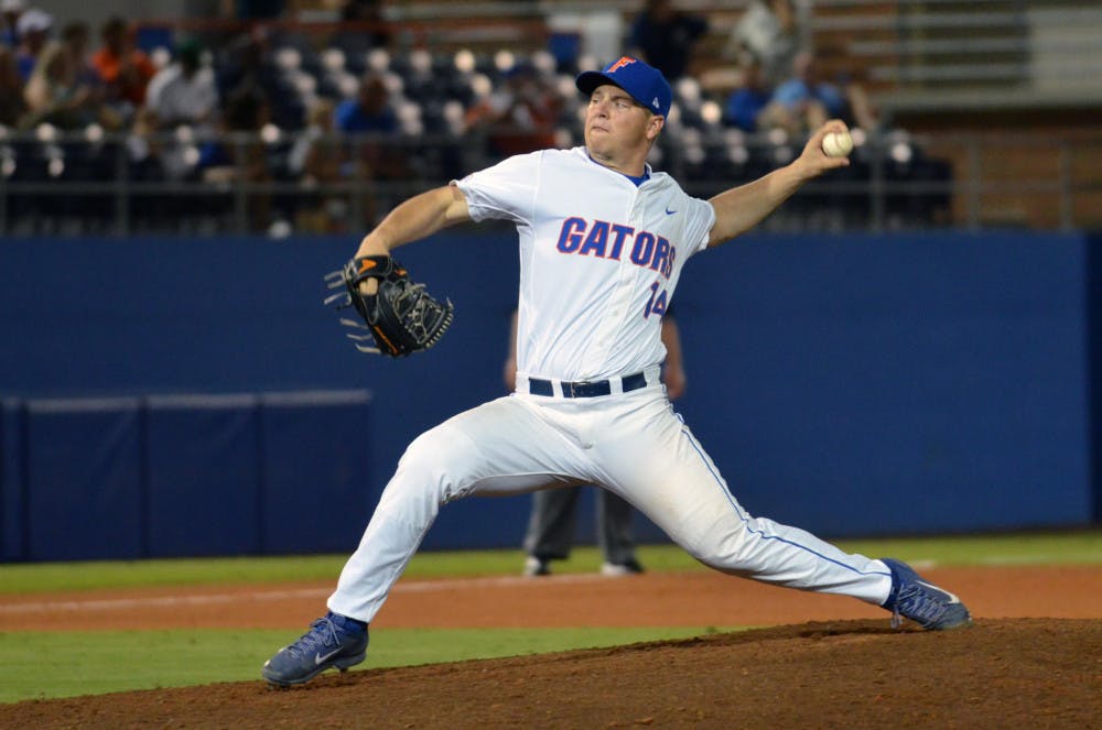 UF's Bobby Poyner throws a slider during Florida's 14-3 win against the South Carolina Gamecocks on April 11, 2015 at McKethan Stadium.